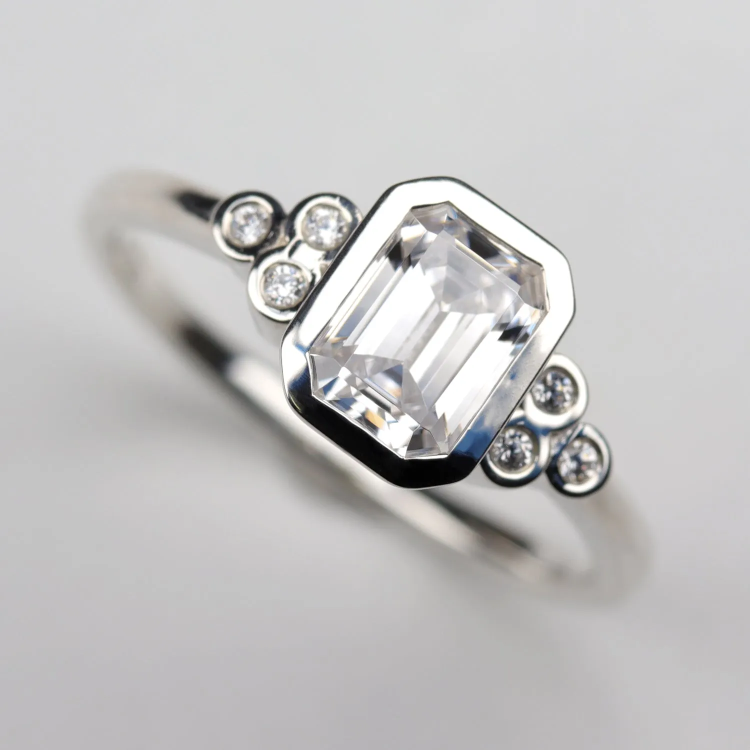 Emerald Cut Openwork Seven Stone Cluster Engagement Ring