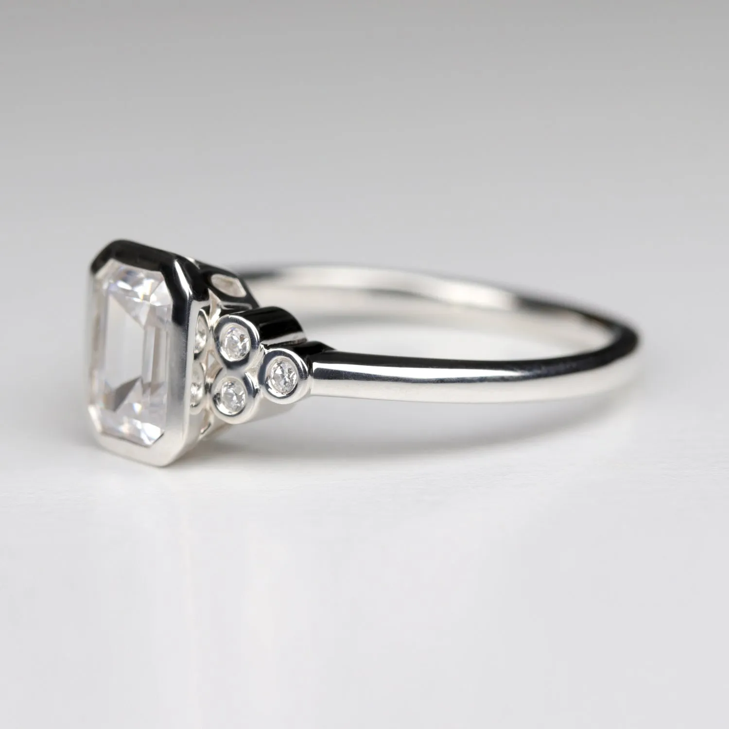 Emerald Cut Openwork Seven Stone Cluster Engagement Ring