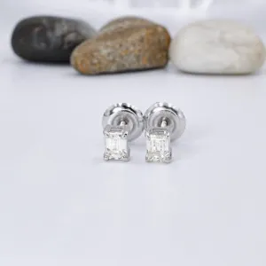 Modern 0.50 CT Emerald Cut Diamond Stud Earrings in 14 KT White Gold